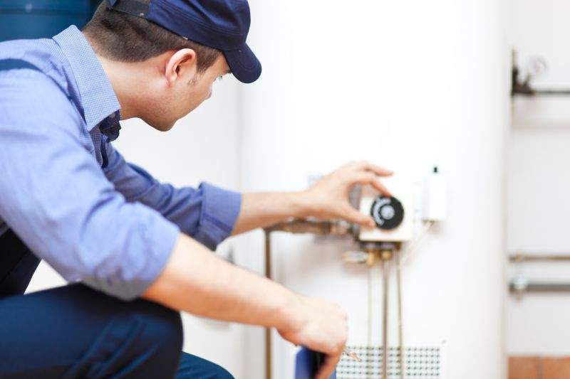 Plumber Installing a Water Heater